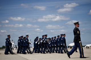 An honor guard approaches after Britain's King Charles and Britain's Queen Camilla landed at Joint Base Andrews, U.S., Maryland, on April 27, 2026. Henry Nicholls/Pool via REUTERS